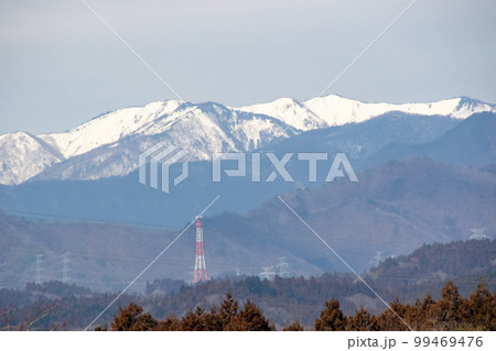 市城駅周辺から見る雪山 99469476