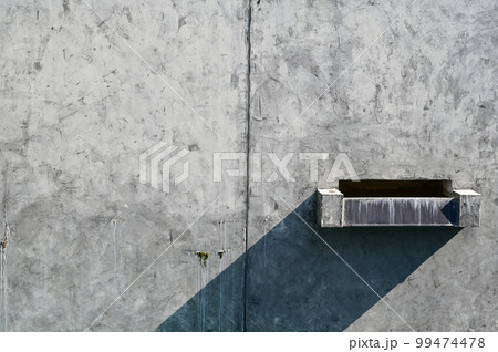 faucet of pool on cement wall background 99474478