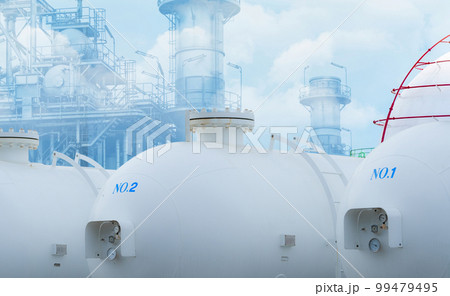 Hydrogen power plant. H2 fuel storage tank with power plant background. Sustainable energy. Net zero emissions by 2050. Clean energy. Industrial gas storage tank. H2 generates electricity and heat. 99479495