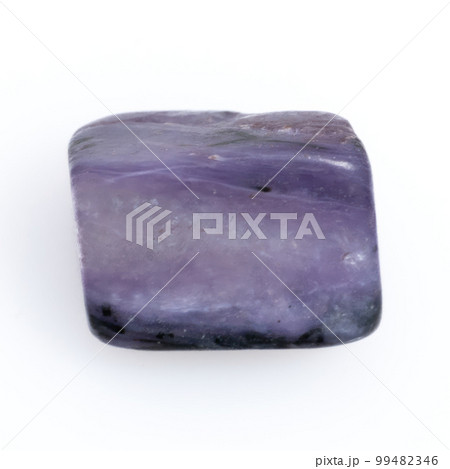 Natural gemstone purple charoite isolated on white background Natural gemstone purple charoite isolated on white background 99482346