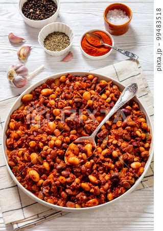 Beans and Sausage bake in baking dish, top view 99483518