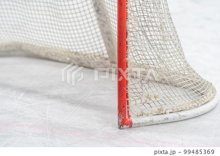 detail of a hockey goal on the ice 99485369