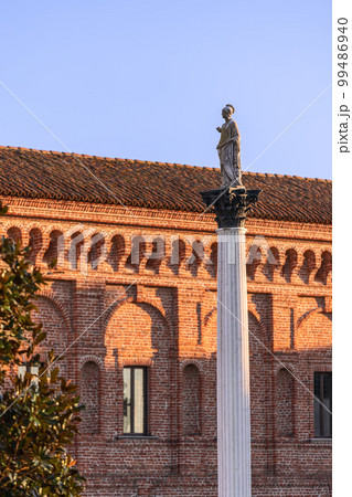 Galleria degli Antichi in Sabbioneta stands the majestic Column with the statue of Minerva Galleria degli Antichi in Sabbioneta stands the majestic Column with the statue of Minerva 99486940