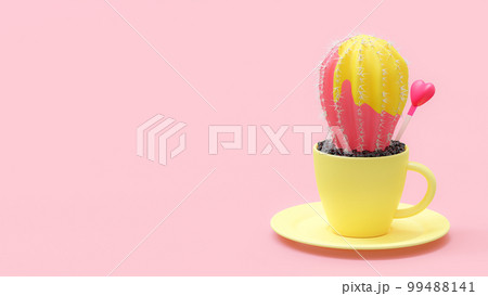 Yellow Pink cactus in coffee mug on pink background. Designed in minimal concept and pastel color style. Yellow Pink cactus in coffee mug on pink background. Designed in minimal concept and pastel color style. 99488141