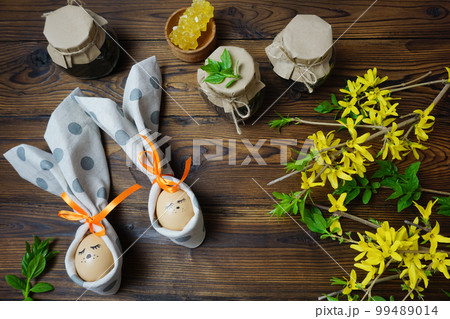 Easter decor of Easter eggs in the form of Easter bunnies Easter decor of Easter eggs in the form of Easter bunnies 99489014