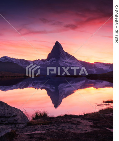 Matterhorn peak on Stellisee lake 99490375