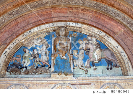 Virgin holding the Christ child, centered between, the Annunciation to the Shepherds and the Adoration of the Magi, Cathedral dedicated to the Virgin Mary in Verona Virgin holding the Christ child, centered between, the Annunciation to the Shepherds and the Adoration of the Magi, Cathedral dedicated to the Virgin Mary in Verona 99490945