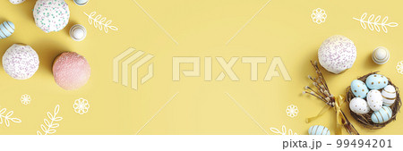 Easter egg and cake on grey table background. Easter egg and cake on grey table background. 99494201