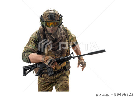 A hired soldier with an automatic rifle running right on the camera. A hired soldier with an automatic rifle running right on the camera. 99496222