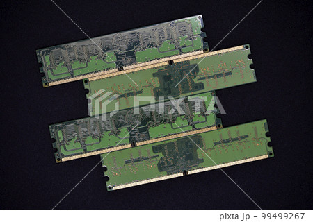 Blue RAM bars on a black background. Computer memory chips. Computer chips. Blue RAM bars on a black background. Computer memory chips. Computer chips. 99499267