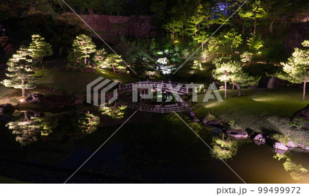 Night view of the Gyokuseninmaru Garden, Kanazawa Castle Park, Japan. 99499972