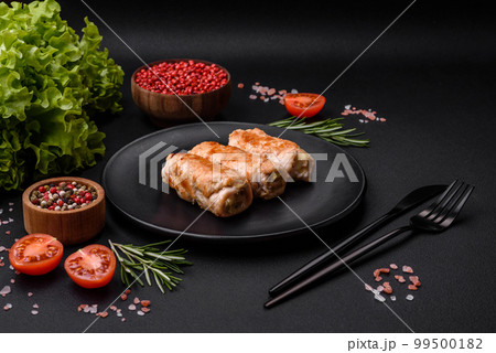Delicious baked pork or chicken roll with mushrooms, spices and herbs Delicious baked pork or chicken roll with mushrooms, spices and herbs 99500182