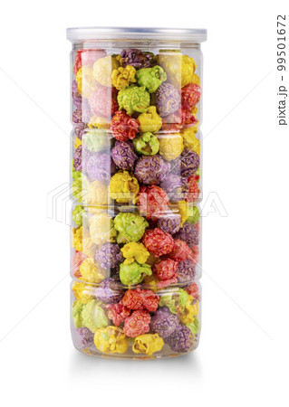 Colorful caramel popcorn in clear jar isolated on white background. 99501672