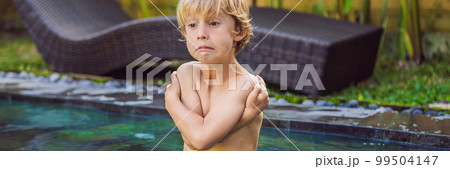 Young boy was frozen in the pool. Very cold water in the pool. Need heated water BANNER, LONG FORMAT 99504147