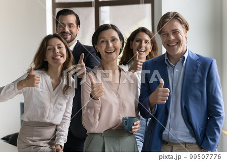 Happy successful diverse business team celebrating achieve Happy successful diverse business team celebrating achieve 99507776