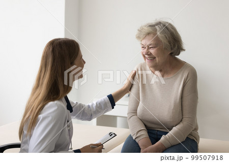 Young doctor woman meeting with older senior female patient Young doctor woman meeting with older senior female patient 99507918