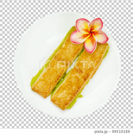 custard bread in a white plate isolated 99510189