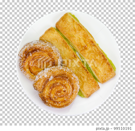 custard bread and cinnamon rolls isolated 99510191