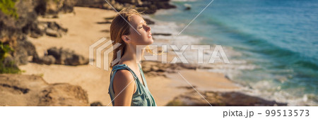 Young woman tourist on Pantai Tegal Wangi Beach, Bali Island, Indonesia. Bali Travel Concept BANNER, LONG FORMAT Young woman tourist on Pantai Tegal Wangi Beach, Bali Island, Indonesia. Bali Travel Concept BANNER, LONG FORMAT 99513573