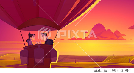 Romantic couple enjoying hot air balloon flight 99513990