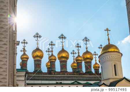 Golden domes of Upper Saviour Cathedral and Terem Churches at the Grand Kremlin Palace in Moscow. 99517493