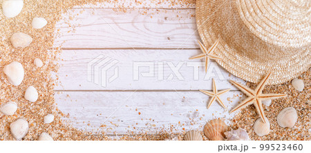 Sand seashells baner background. Summer time concept with sea shells and starfish on wooden background and sand 99523460