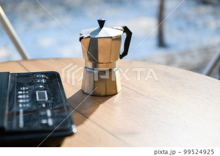 Geyser retro coffee maker on a wooden table Geyser retro coffee maker on a wooden table 99524925
