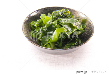 Laminaria (Kelp) Seaweed in black ceremic bowl. Japanese healthy food. Laminaria (Kelp) Seaweed in black ceremic bowl. Japanese healthy food. 99526297