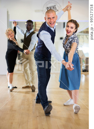 Man and woman learning to dance classical ballroom dance Man and woman learning to dance classical ballroom dance 99527358