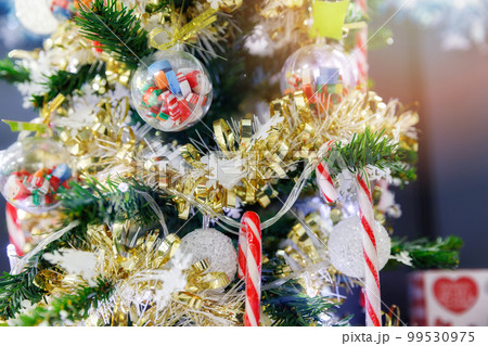 Decorated Christmas tree lights twinkling and sparkling. 99530975