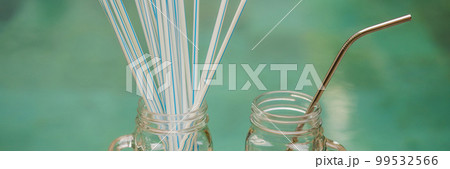 Steel drinking vs disposable straws on pool background. Zero waste concept BANNER, LONG FORMAT 99532566