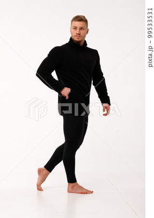 A man with a sporty physique in thermal underwear. 99533531