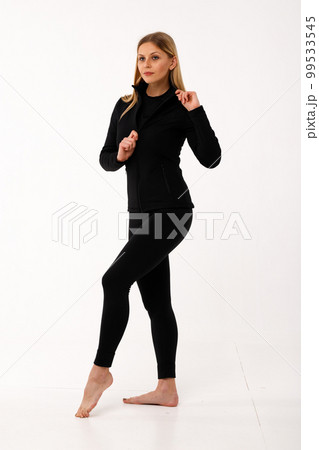 Sporty blonde girl in thermal clothing for women Sporty blonde girl in thermal clothing for women 99533545
