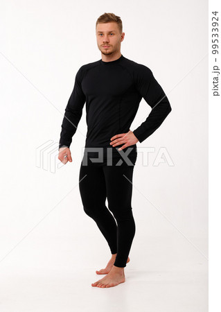 A man with a sporty physique in thermal underwear. 99533924