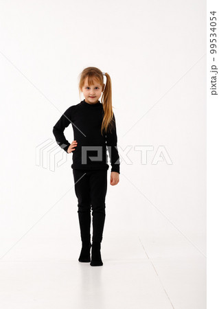 A little girl and her older brother in thermal clothes. A little girl and her older brother in thermal clothes. 99534054