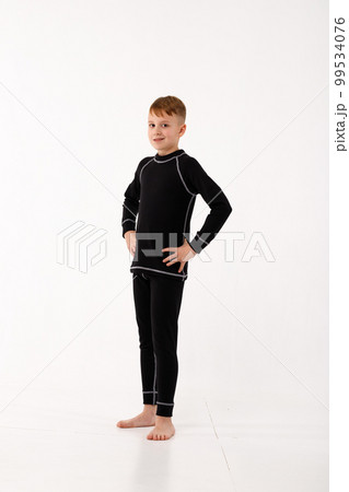 A little girl and her older brother in thermal clothes. A little girl and her older brother in thermal clothes. 99534076