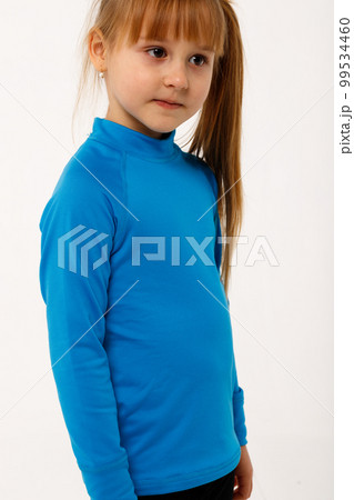 A little girl and her older brother in thermal clothes. A little girl and her older brother in thermal clothes. 99534460