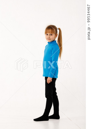 A little girl and her older brother in thermal clothes. A little girl and her older brother in thermal clothes. 99534467