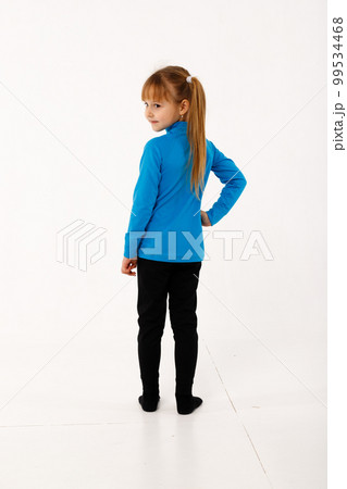 A little girl and her older brother in thermal clothes. A little girl and her older brother in thermal clothes. 99534468
