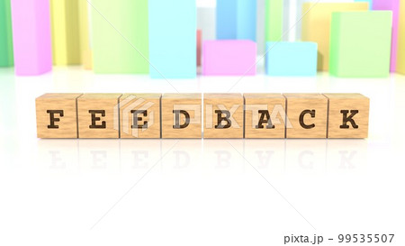FEEDBACKの文字が印字された木製ブロック 99535507