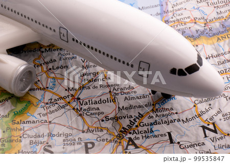 Passenger plane on a map highlighting Rome, Italy through selective focus, background blur. High quality photo Passenger plane on a map highlighting Rome, Italy through selective focus, background blur. High quality photo 99535847