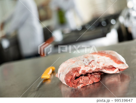 Raw fresh mutton meat lies on cutting table 99539647