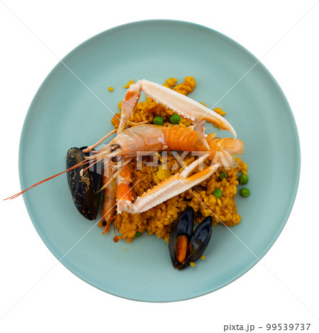 National dish of Spanish cuisine is Paella with seafood 99539737