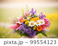 Fresh bright spring flowers in a bouquet 99554123
