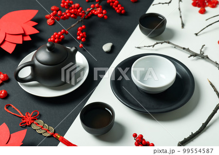 Concept of hot drink, asian tea accessories, isolated on white background  Stock Photo by AtlasComposer