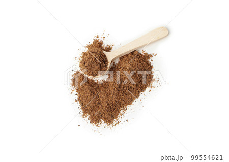 Concept of spices and condiments, nutmeg powder, isolated on white background 99554621