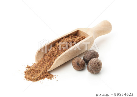 Concept of spices and condiments, nutmegs, isolated on white background 99554622