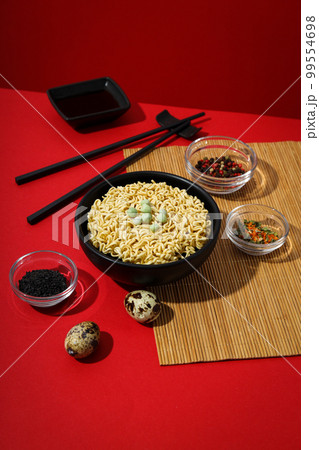 Concept of instant food, tasty instant noodles Concept of instant food, tasty instant noodles 99554698
