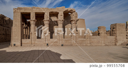 The Temple of Edfu in Edfu, Egypt external daylight view showing the birth house (mammisi of Edfu Temple )situated in front of the main temple The Temple of Edfu in Edfu, Egypt external daylight view showing the birth house (mammisi of Edfu Temple )situated in front of the main temple 99555708