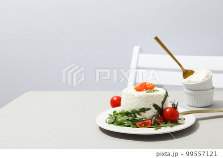 Concept of tasty dairy product - ricotta cheese, space for text Concept of tasty dairy product - ricotta cheese, space for text 99557121